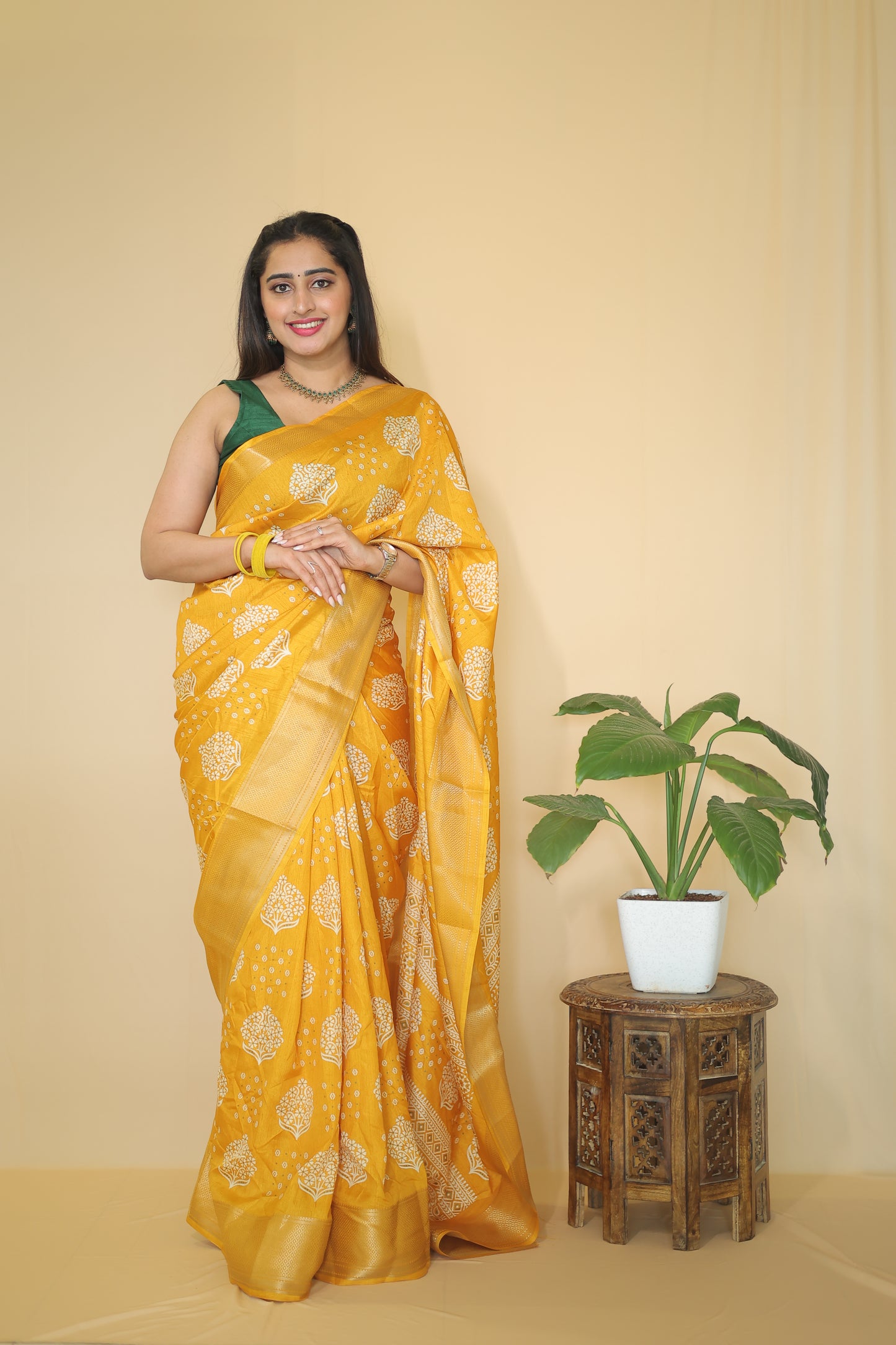 Yellow color Banarasi Silk Saree with Intricate White Floral Motifs
