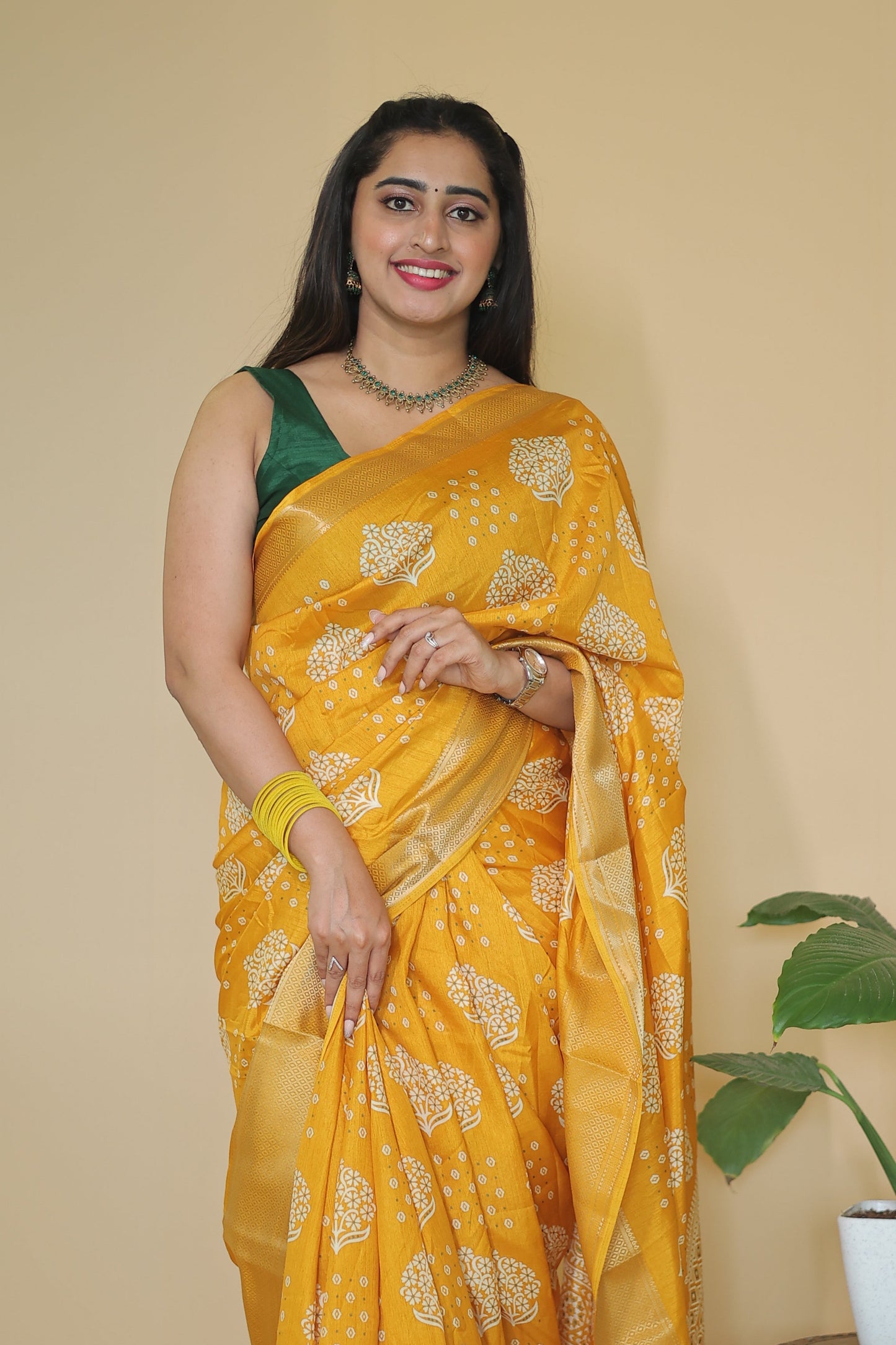 Yellow color Banarasi Silk Saree with Intricate White Floral Motifs