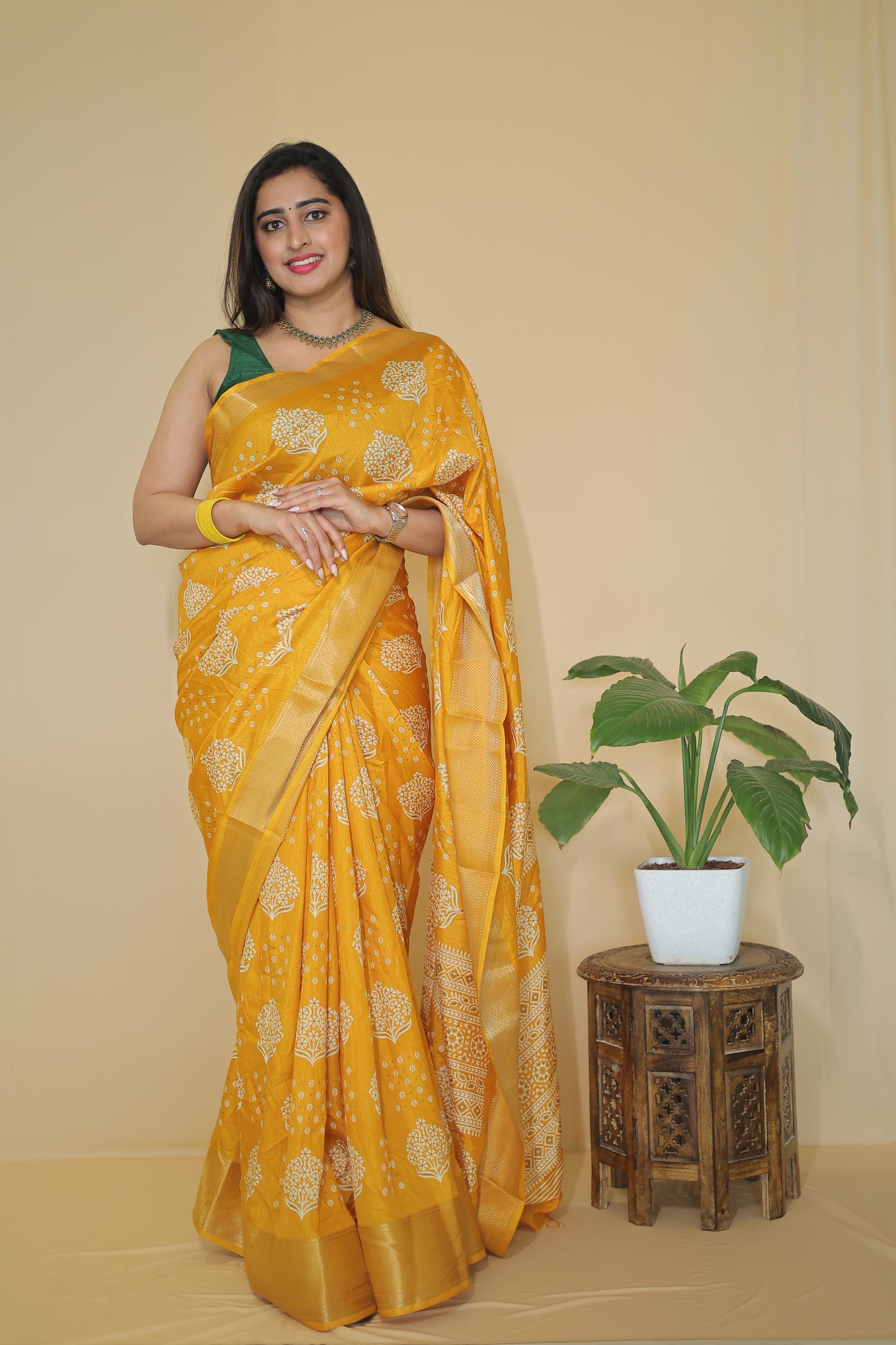 Yellow color Banarasi Silk Saree with Intricate White Floral Motifs