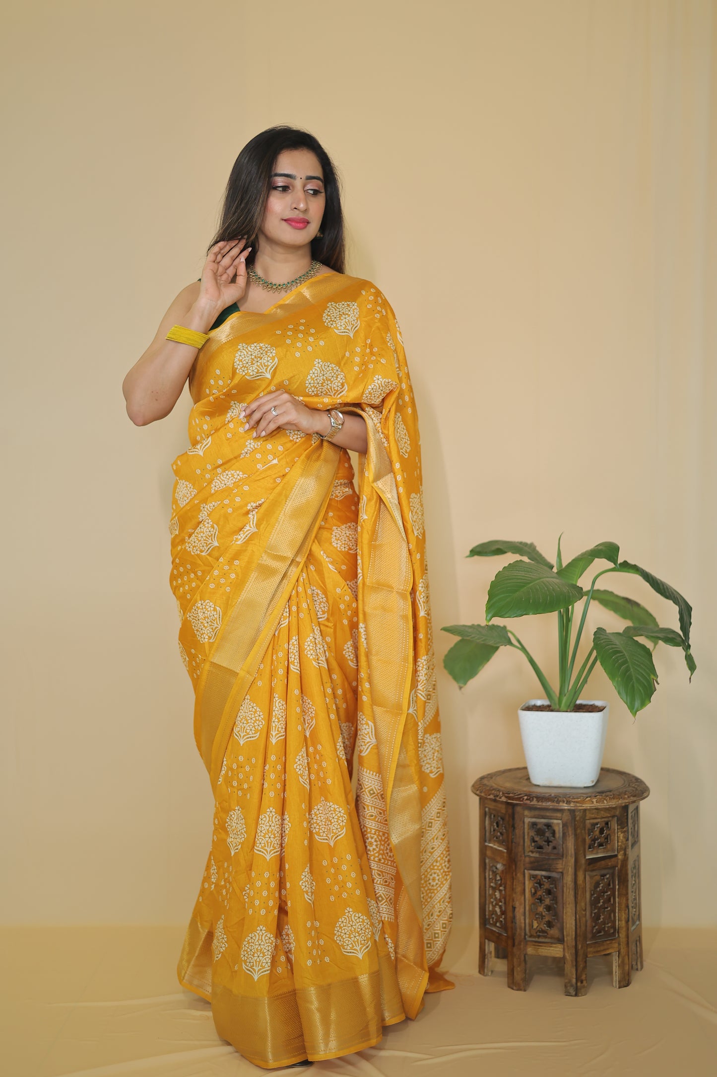 Yellow color Banarasi Silk Saree with Intricate White Floral Motifs