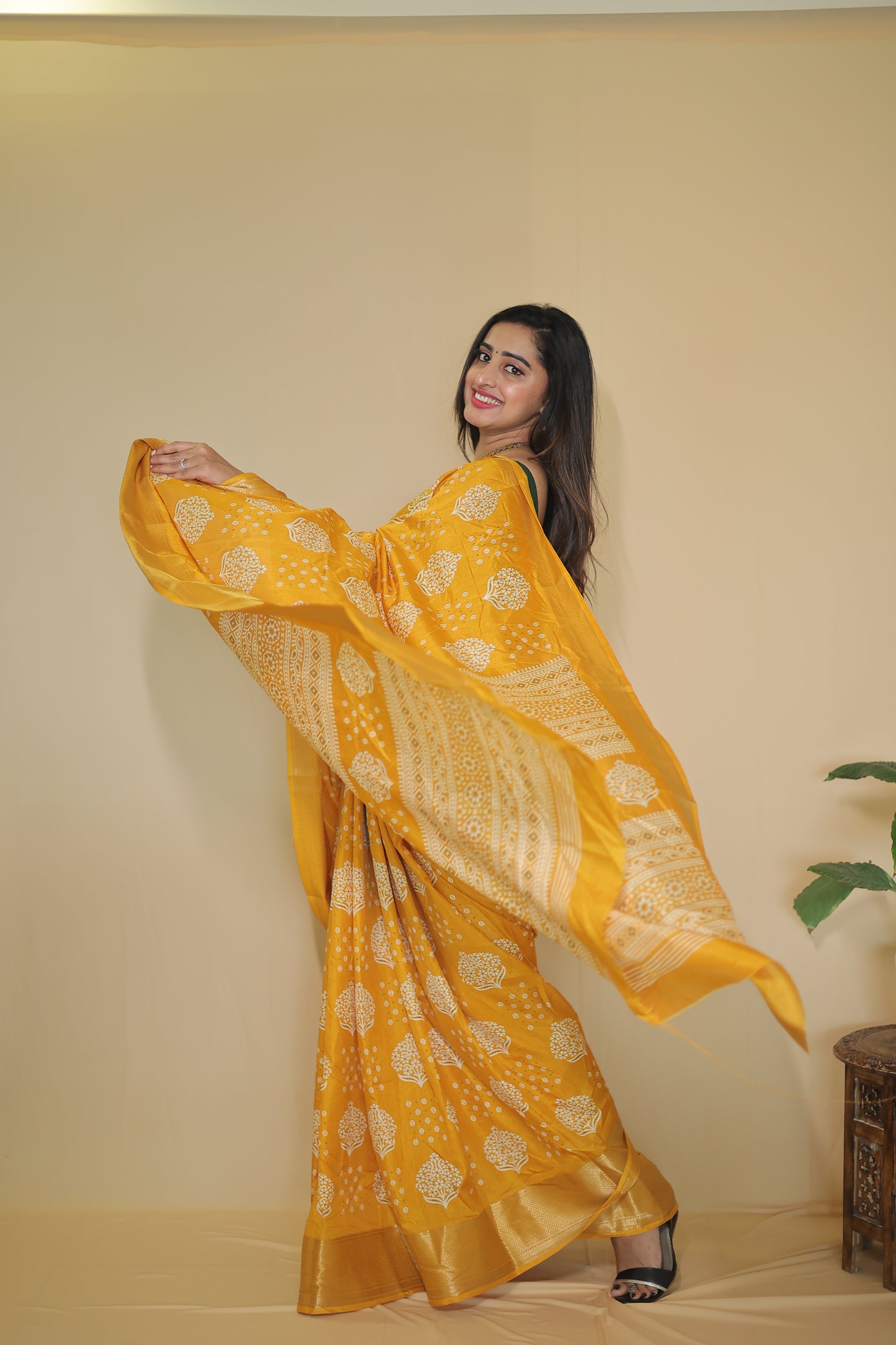 Yellow color Banarasi Silk Saree with Intricate White Floral Motifs
