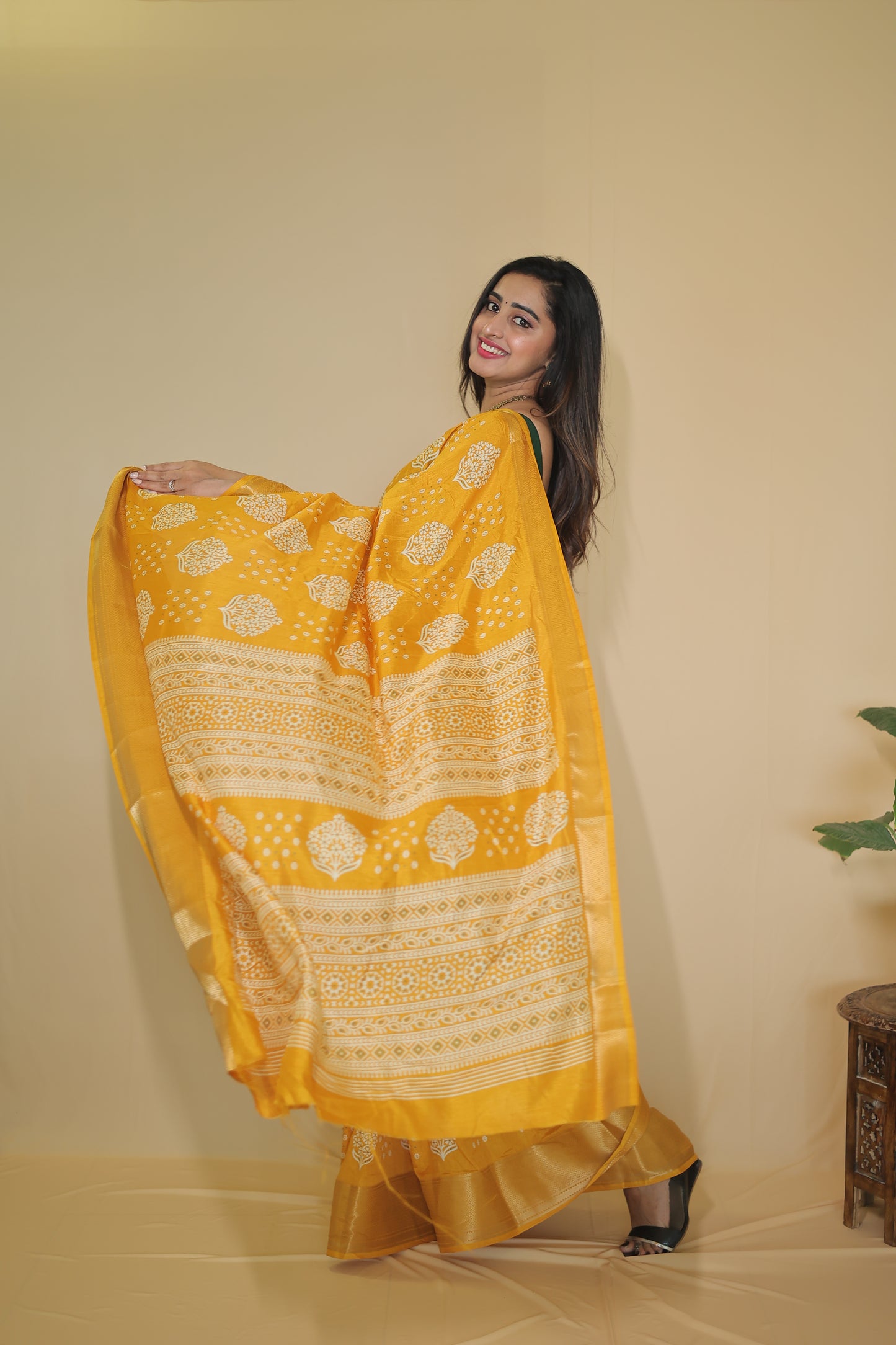 Yellow color Banarasi Silk Saree with Intricate White Floral Motifs