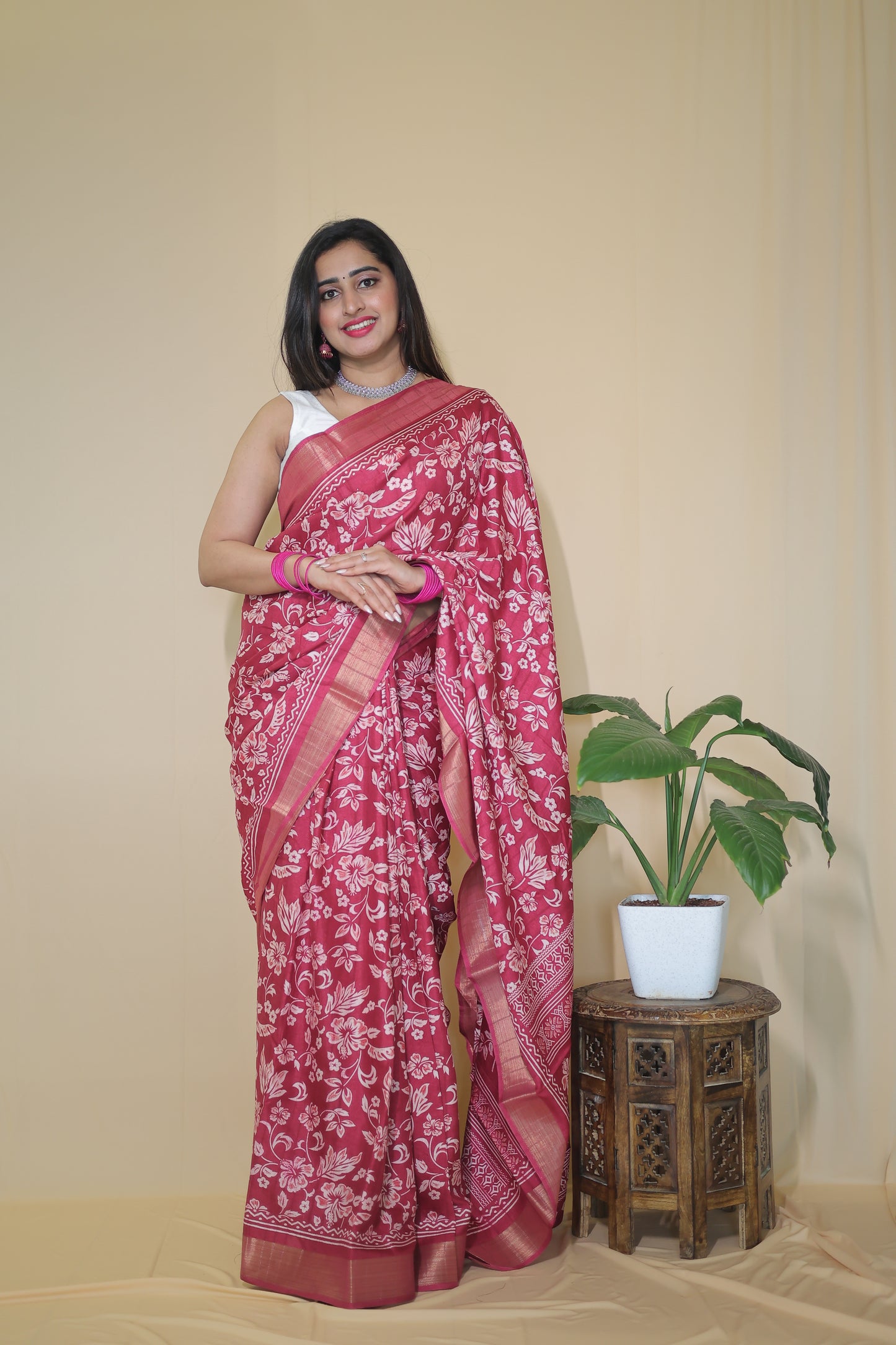 Rani Pink Banarasi Silk Saree with White Floral Motifs and Traditional Border