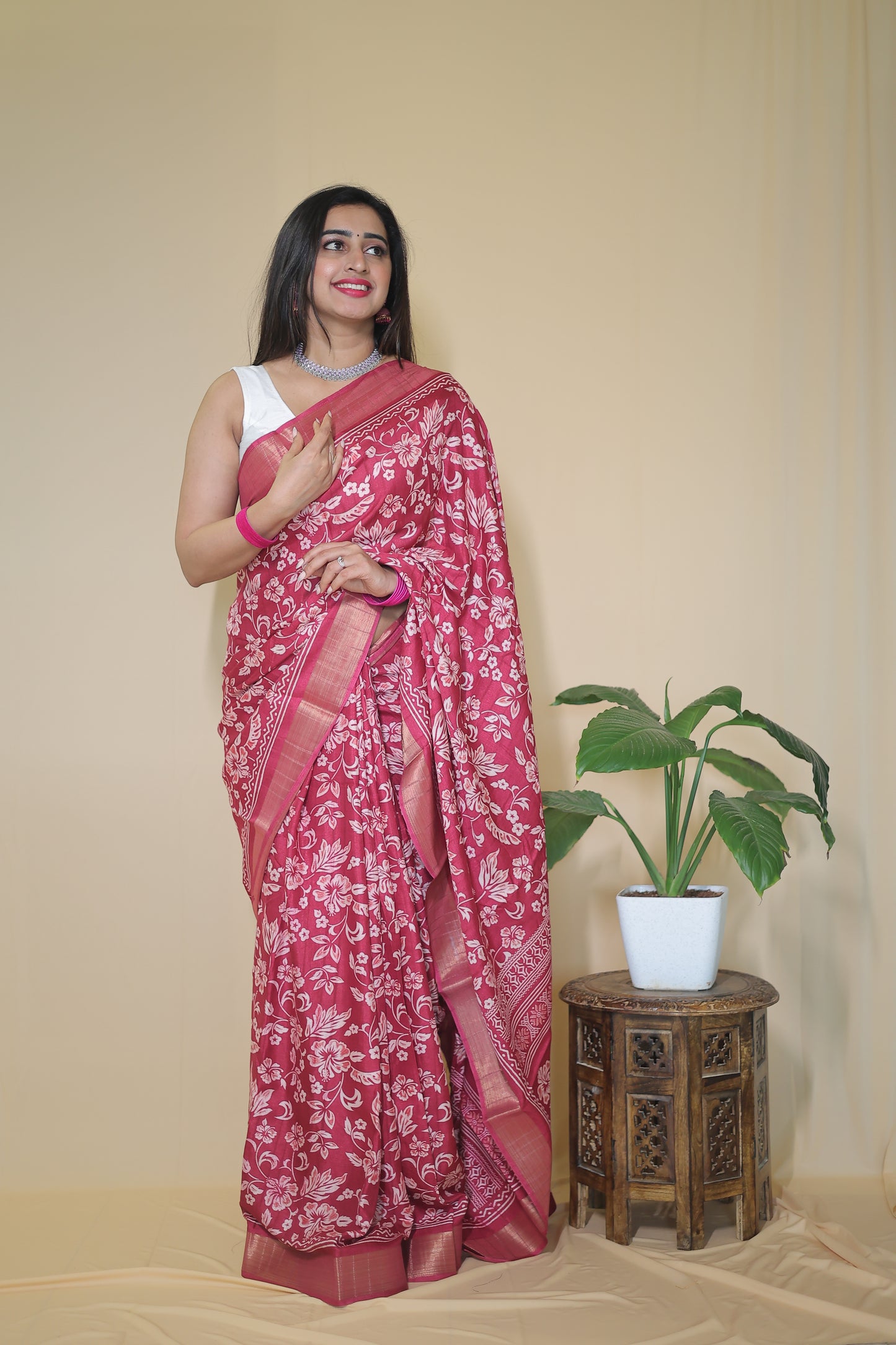 Rani Pink Banarasi Silk Saree with White Floral Motifs and Traditional Border