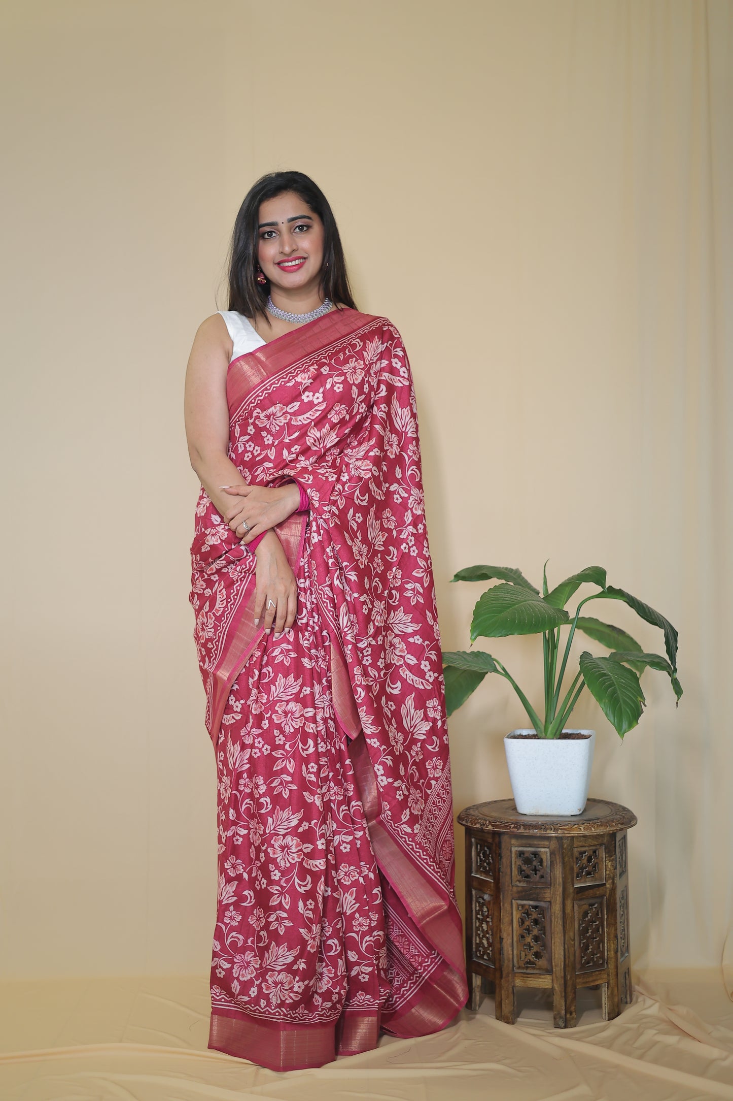 Rani Pink Banarasi Silk Saree with White Floral Motifs and Traditional Border