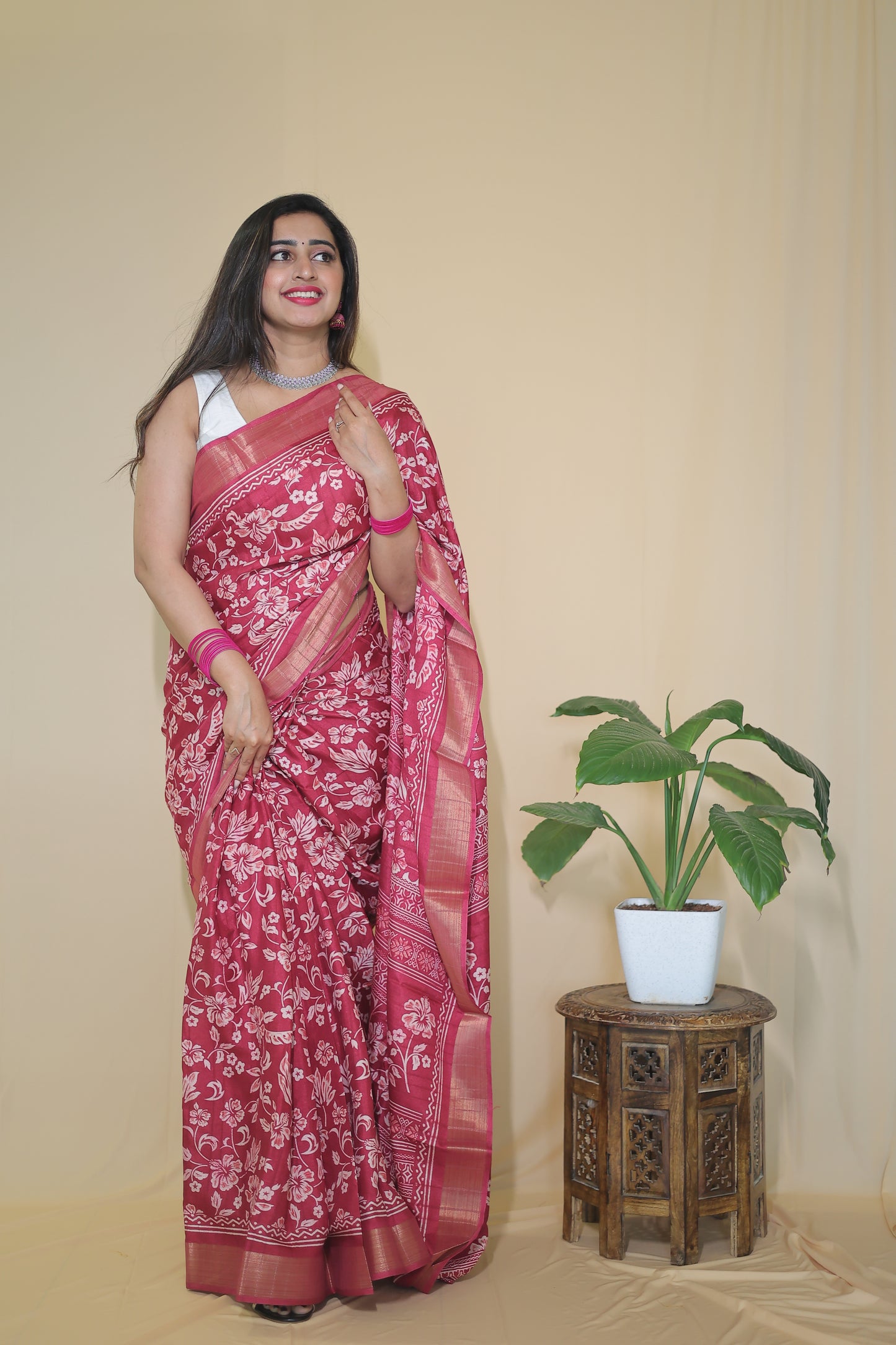 Rani Pink Banarasi Silk Saree with White Floral Motifs and Traditional Border