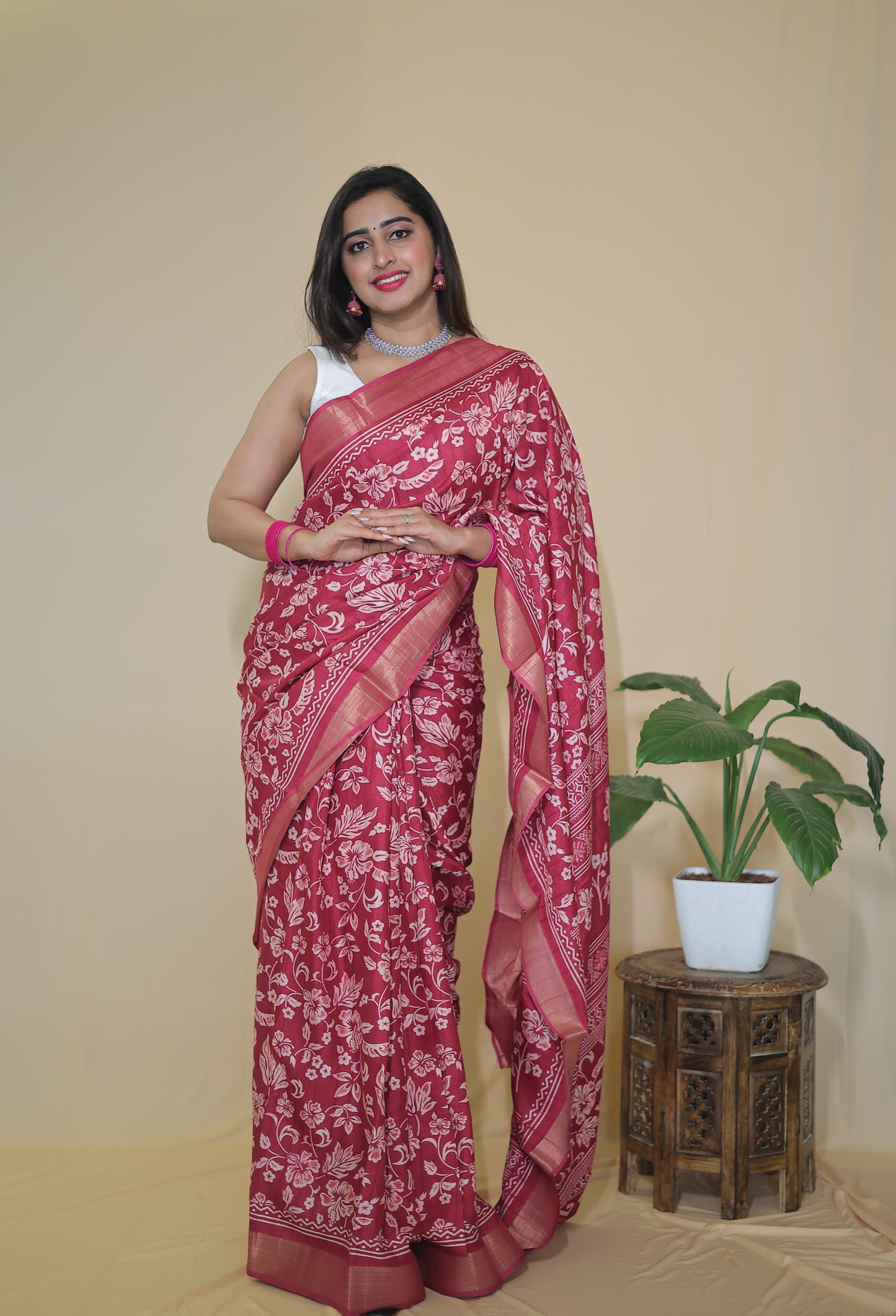 Rani Pink Banarasi Silk Saree with White Floral Motifs and Traditional Border