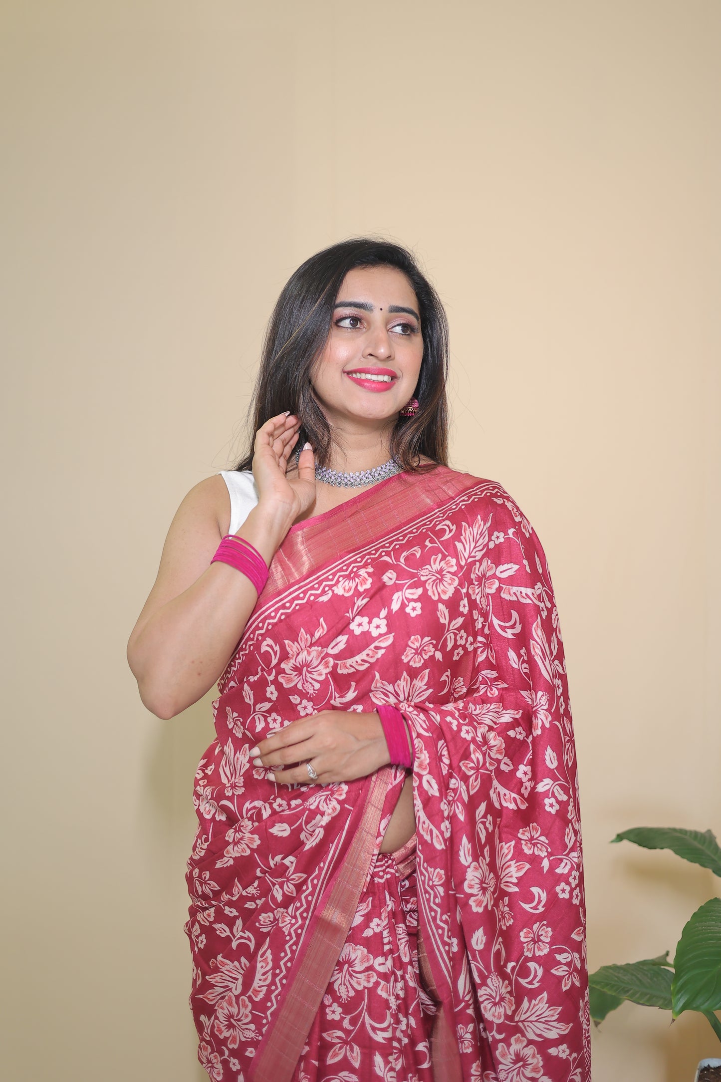 Rani Pink Banarasi Silk Saree with White Floral Motifs and Traditional Border