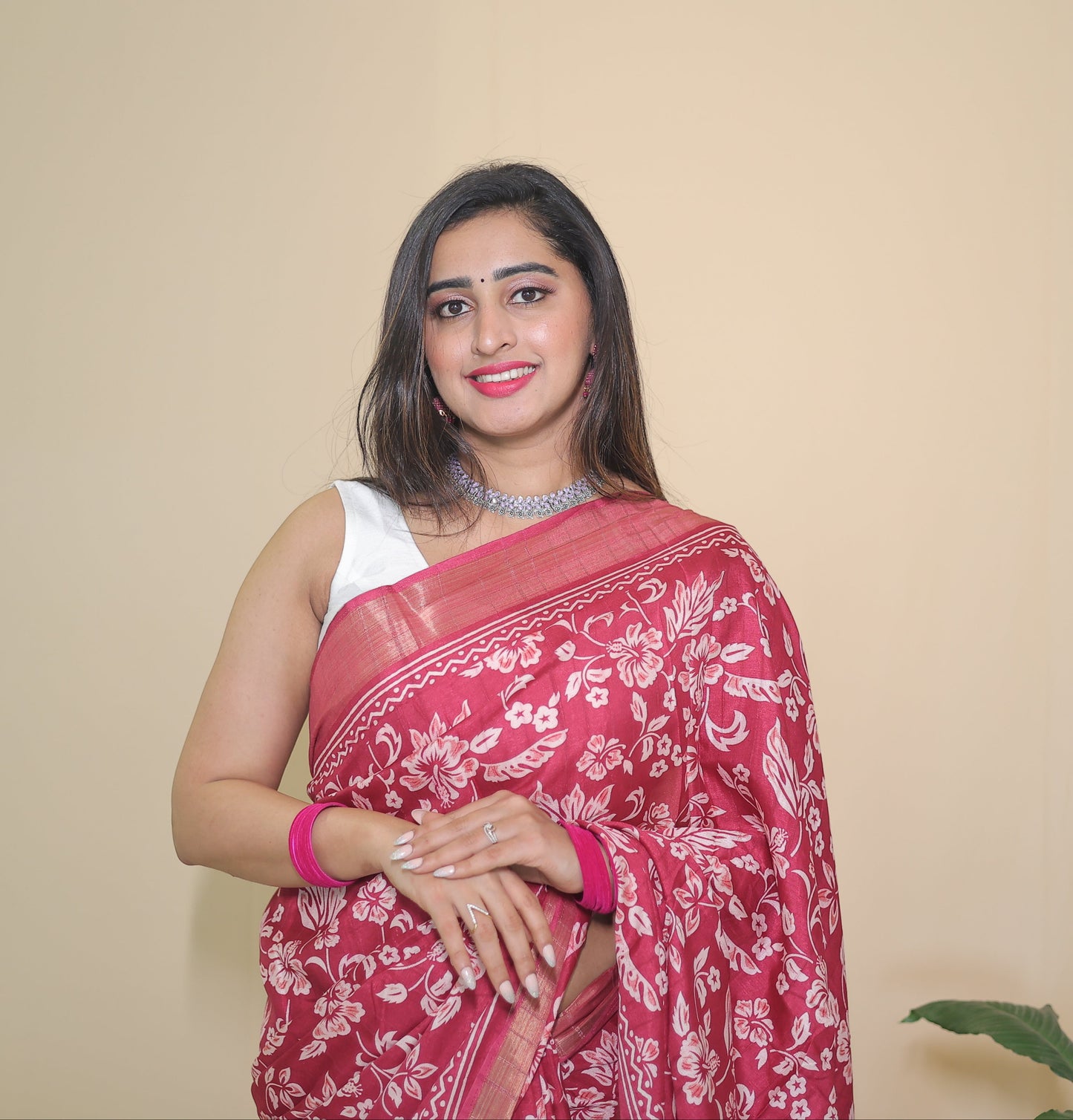 Rani Pink Banarasi Silk Saree with White Floral Motifs and Traditional Border