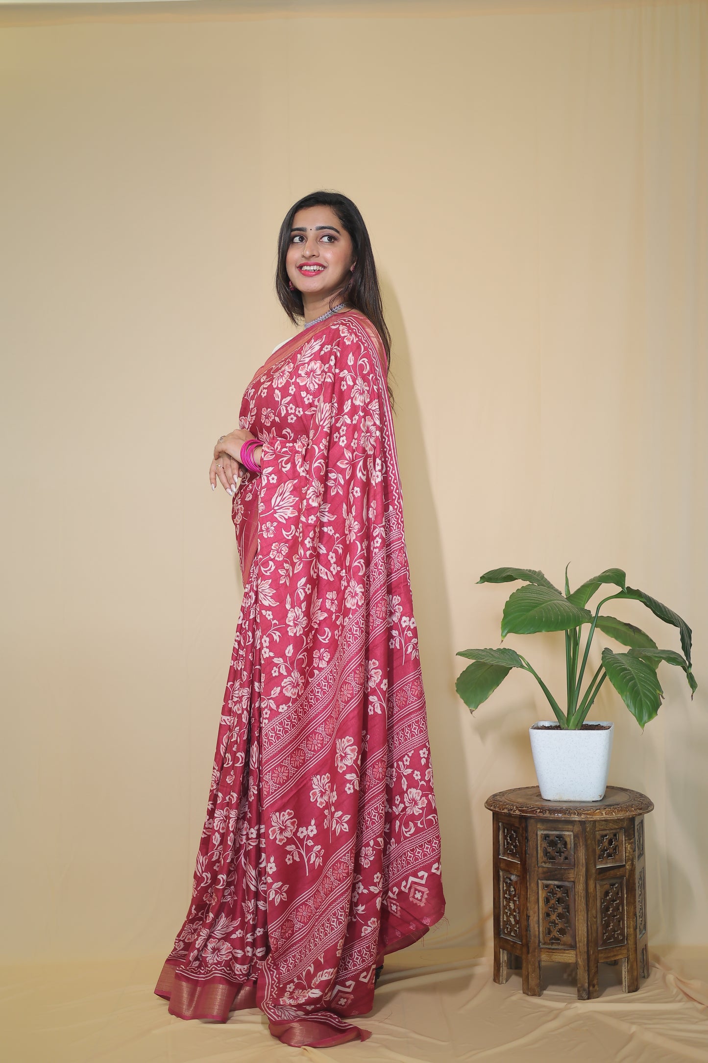 Rani Pink Banarasi Silk Saree with White Floral Motifs and Traditional Border
