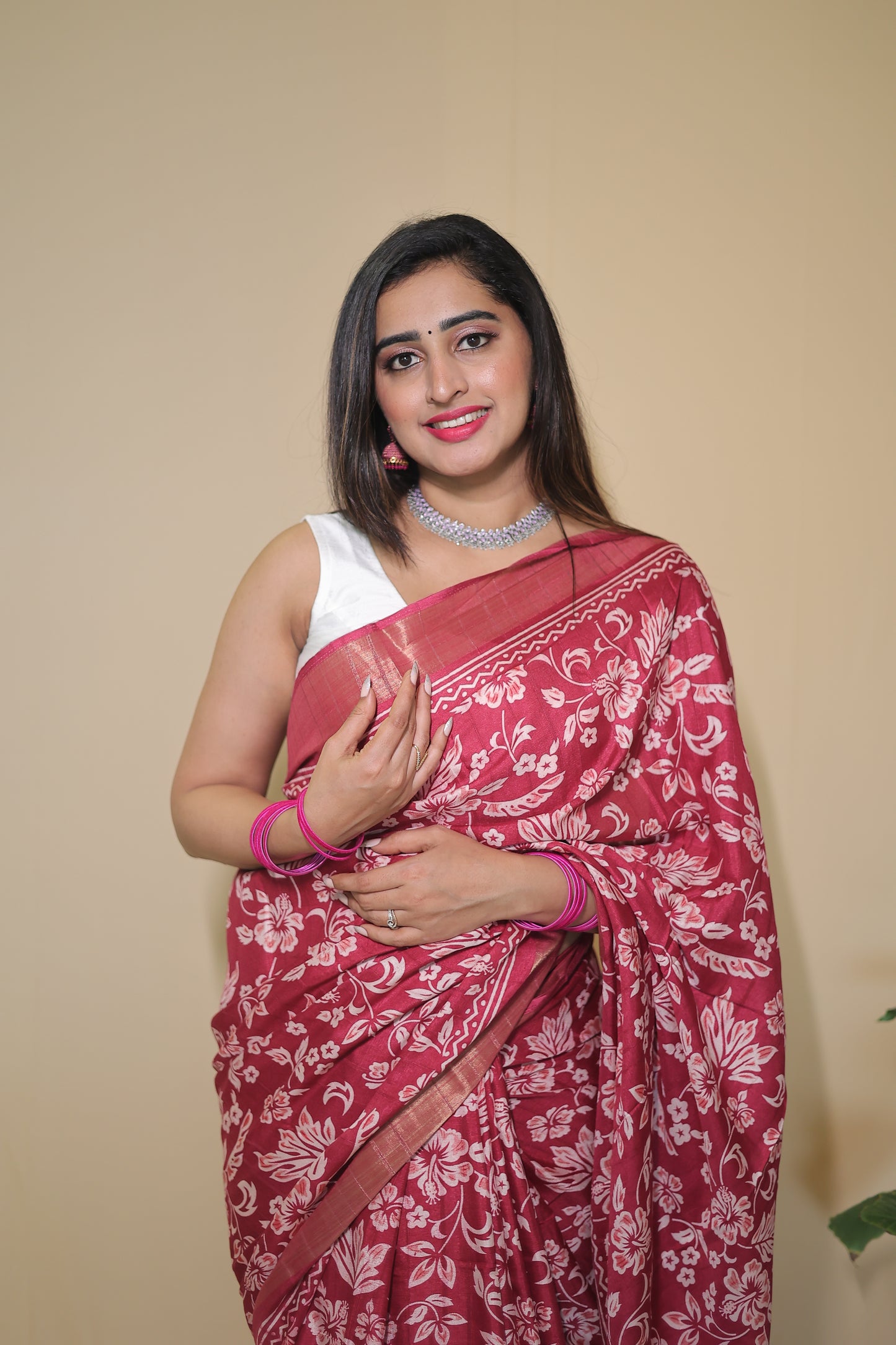 Rani Pink Banarasi Silk Saree with White Floral Motifs and Traditional Border