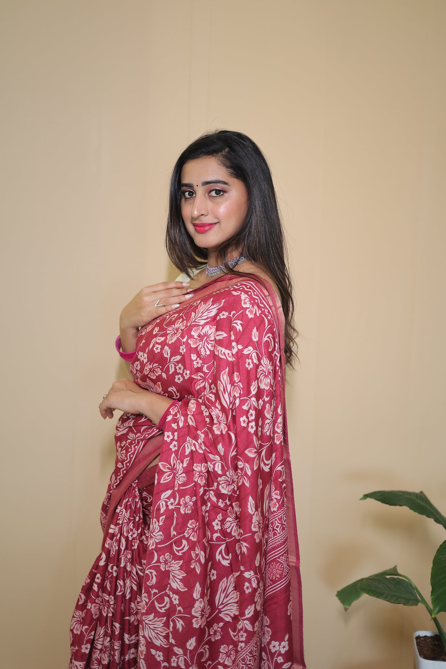 Rani Pink Banarasi Silk Saree with White Floral Motifs and Traditional Border