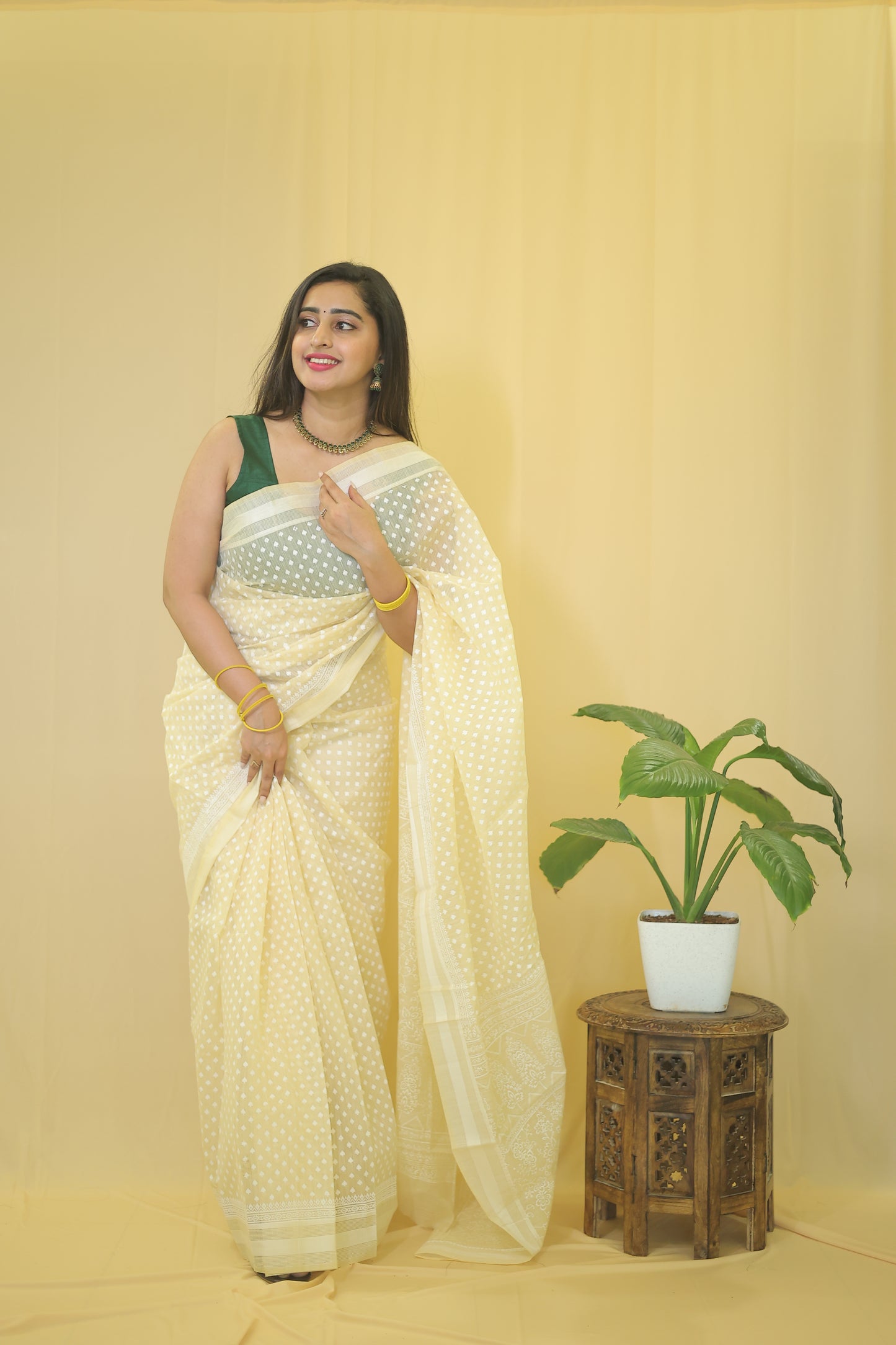 Graceful Cream Cotton Saree with Polka Dot Elegance