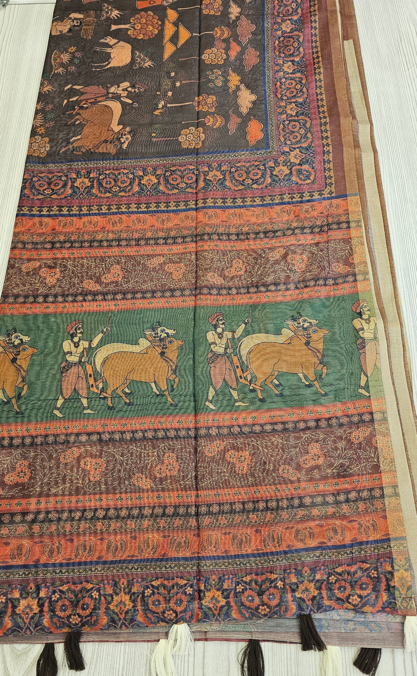 Kalamkari-inspired digital print with heritage storytelling motifs and floral patterns