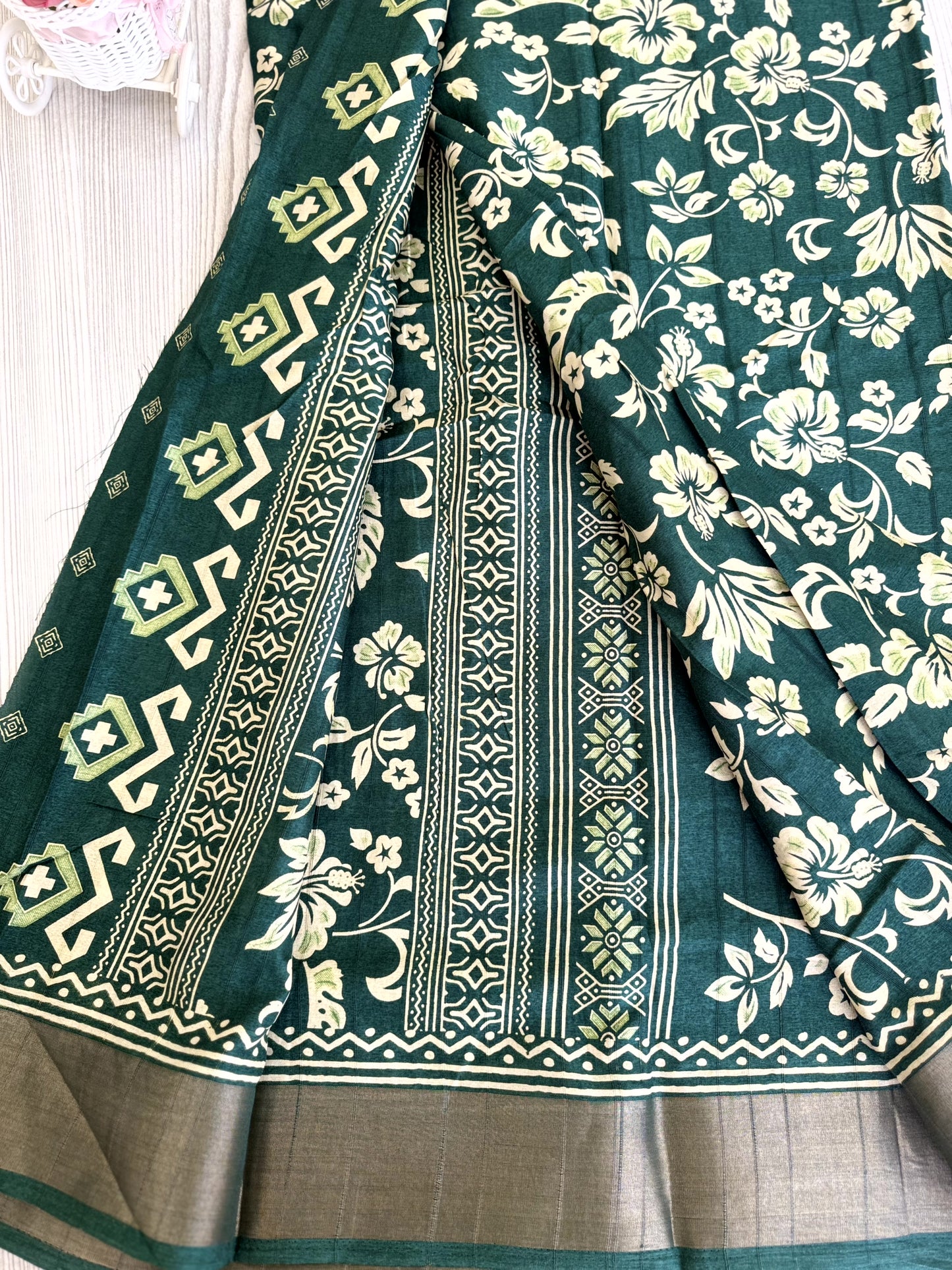 Green Banarasi Silk Saree with White Floral Motifs and Traditional Border