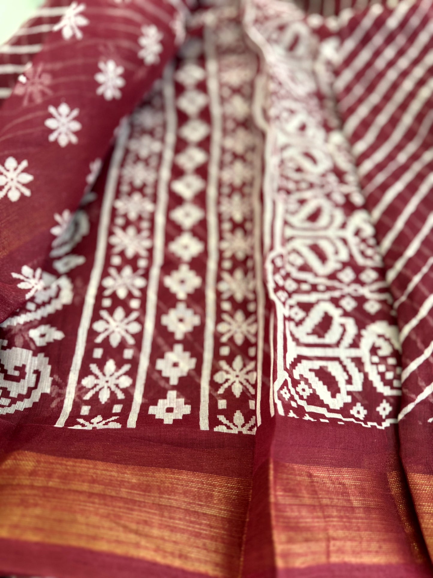 Elegant Maroon Cotton Saree with Intricate Paisley and Floral Patterns