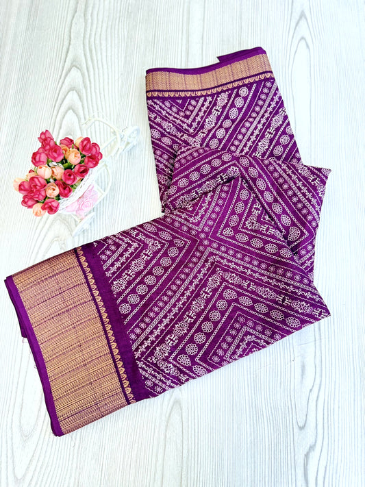 Graceful Purple Soft Silk Saree with Golden Border and Traditional Patterns