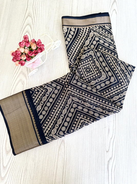 Graceful Black Soft Silk Saree with Golden Border and Traditional Patterns