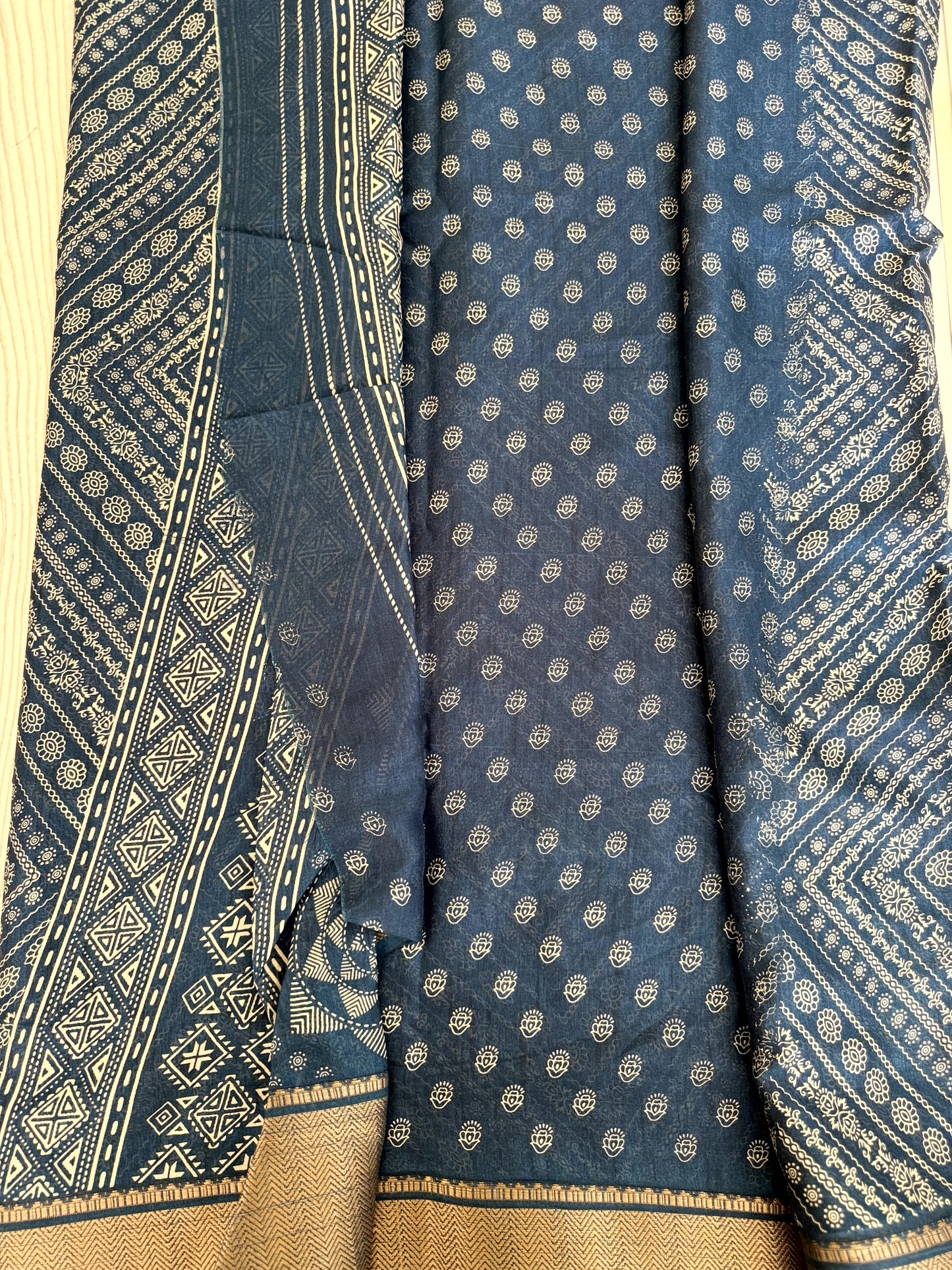 Graceful Sky blue Soft Silk Saree with Golden Border and Traditional Patterns