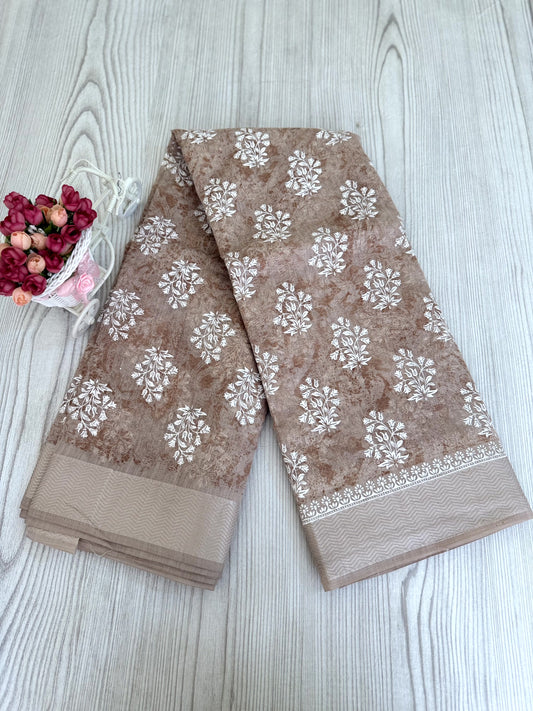 Graceful light brown Cotton Saree with white flower motifs