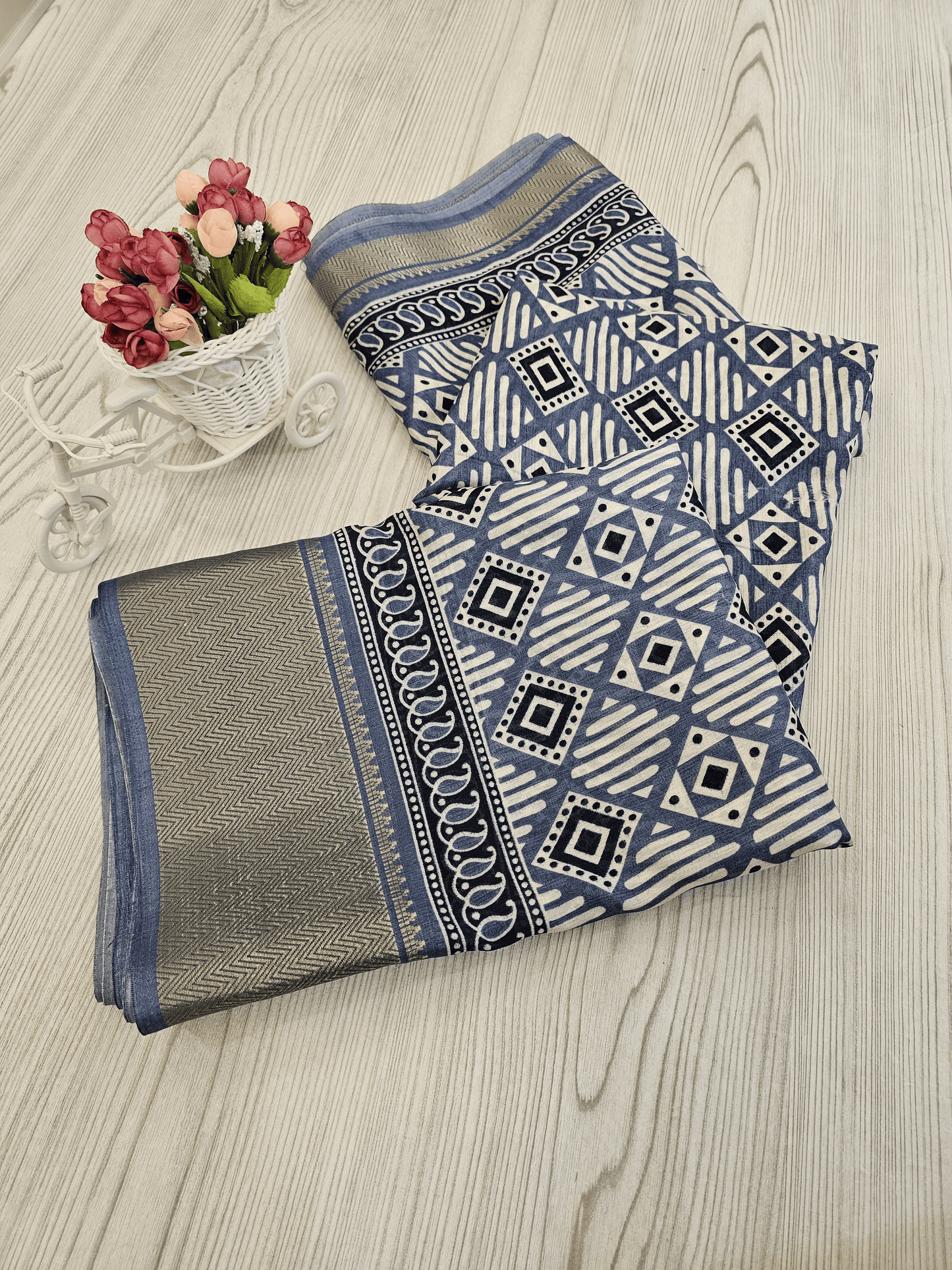 Elegant Blue Geometric Printed Saree with Contrasting Border