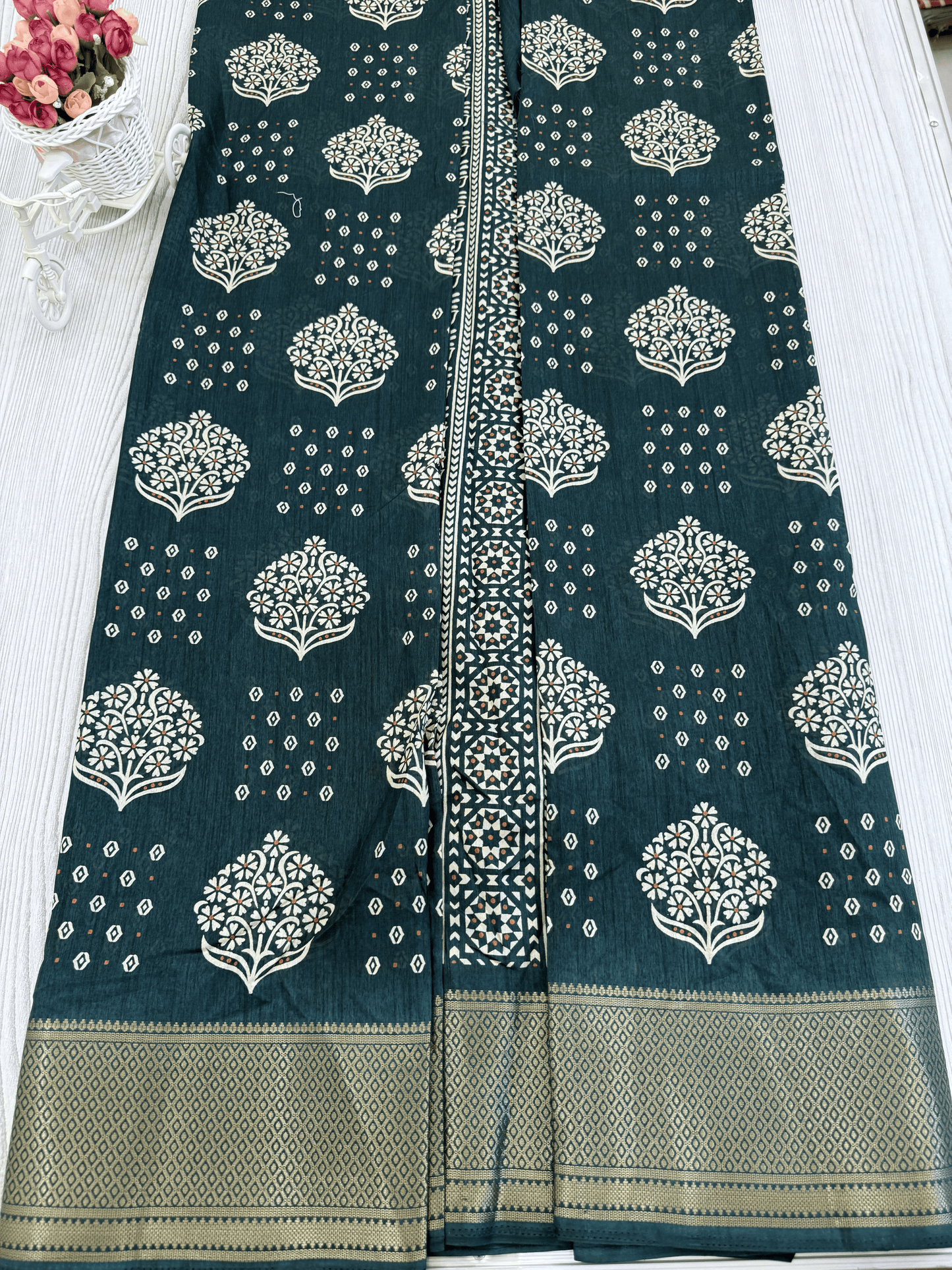 Guntur Green Banarasi Silk Saree with Intricate White Floral Motifs
