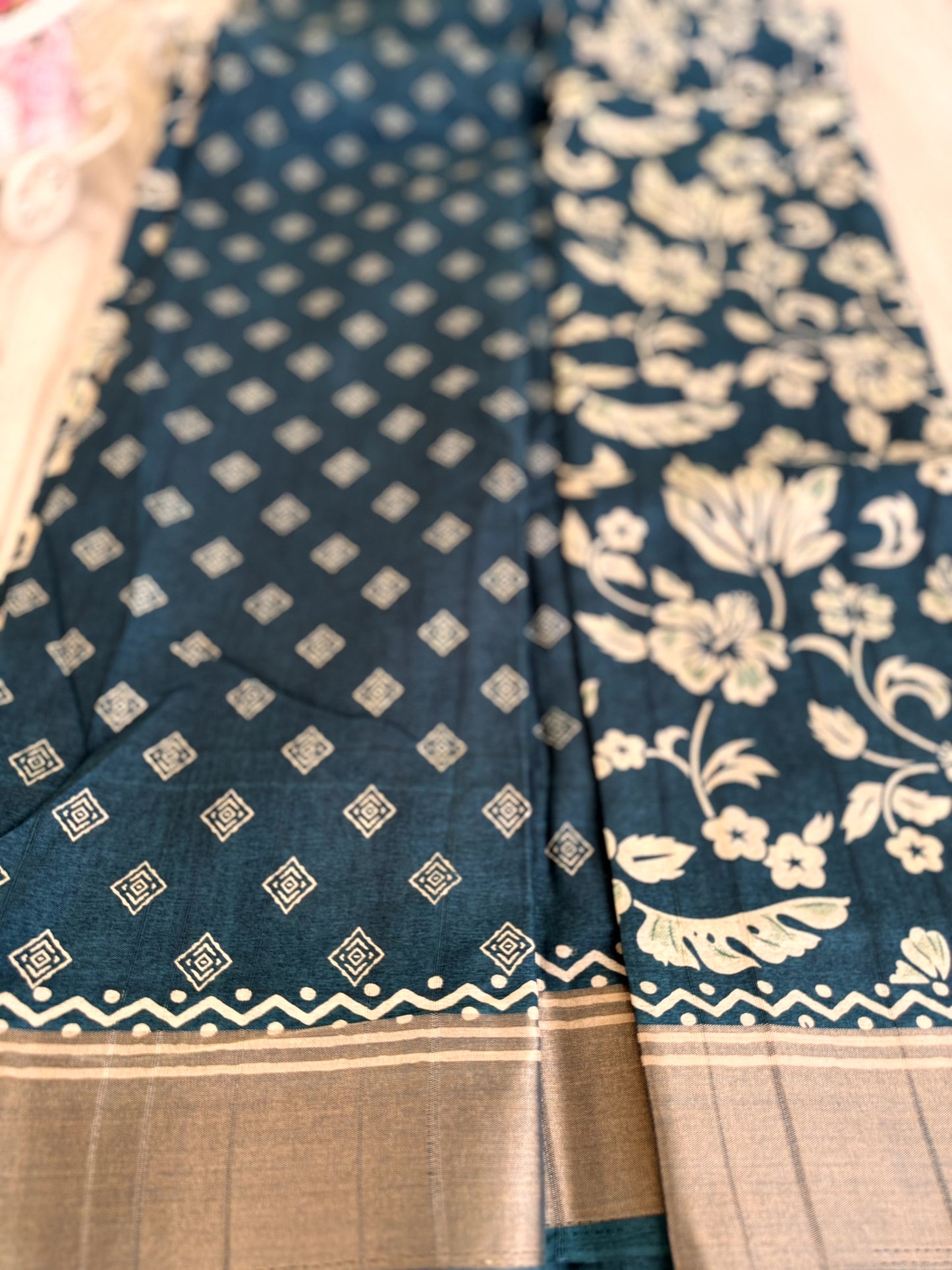 Tale Blue Banarasi Silk Saree with White Floral Motifs and Traditional Border